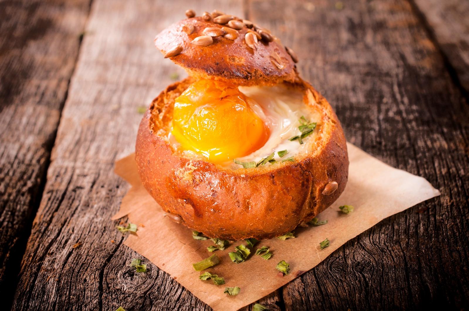 Baked Eggs in Bread Bowls